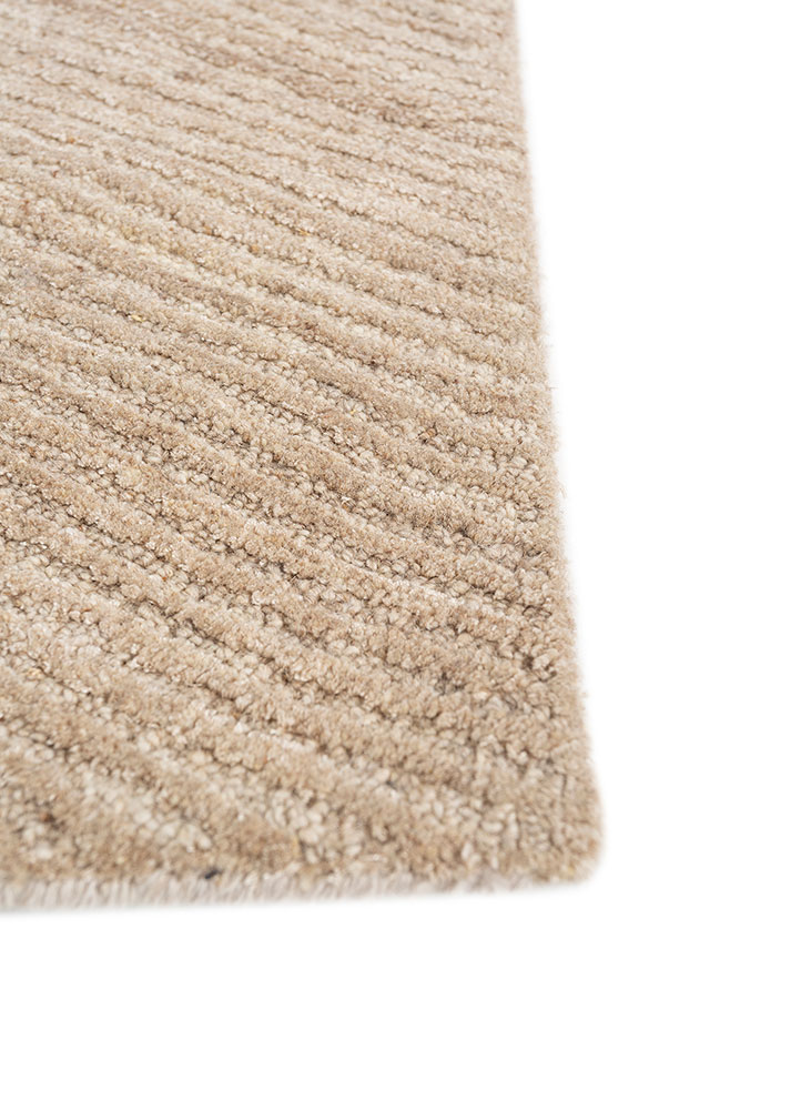 come around ivory wool and viscose hand tufted Rug - Corner