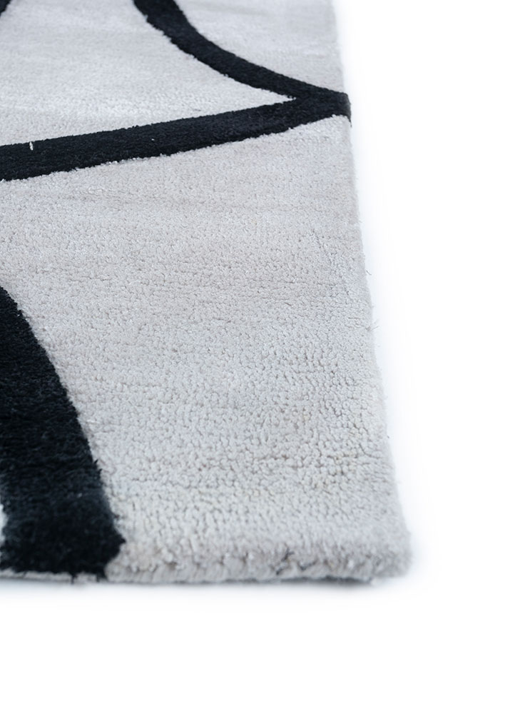 contour ivory wool and viscose hand tufted Rug - Corner