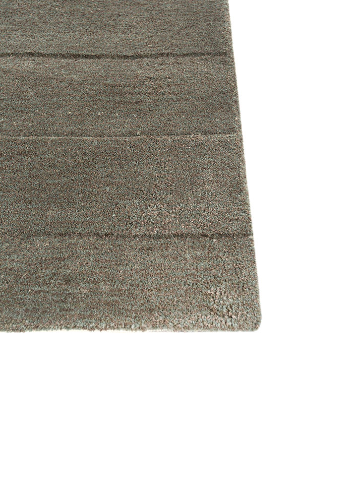 caliedo blue wool and viscose hand tufted Rug - Corner