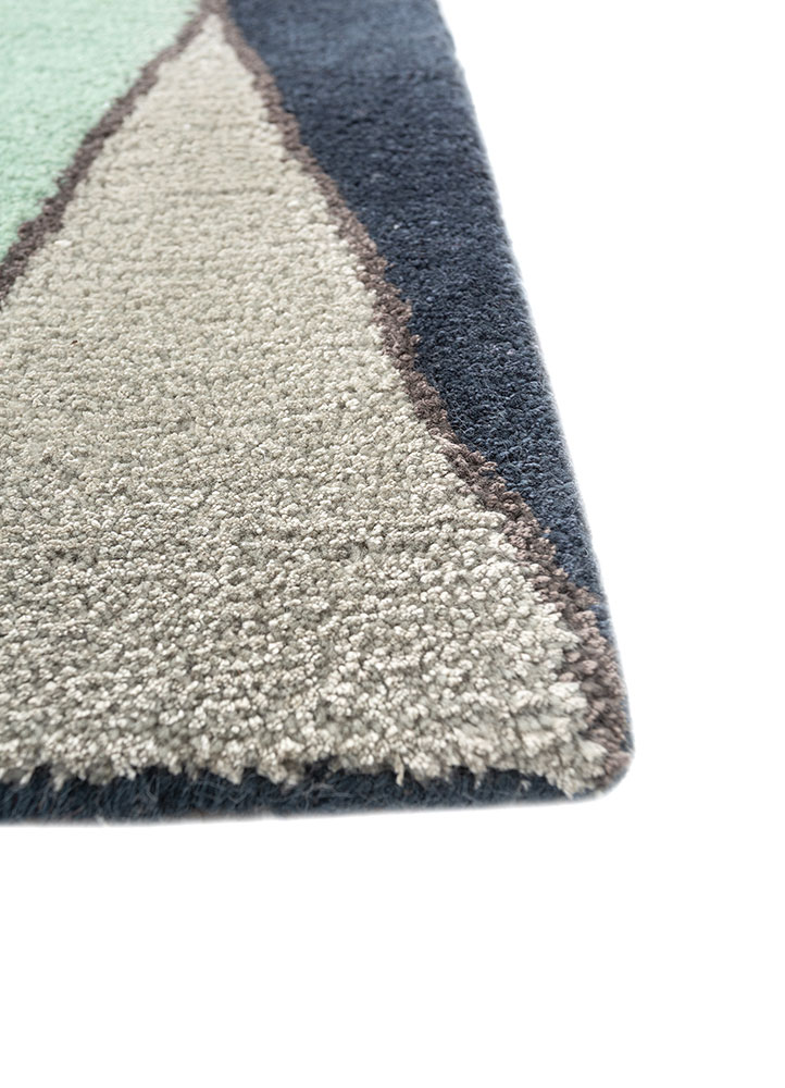 linear blue wool and viscose hand tufted Rug - Corner