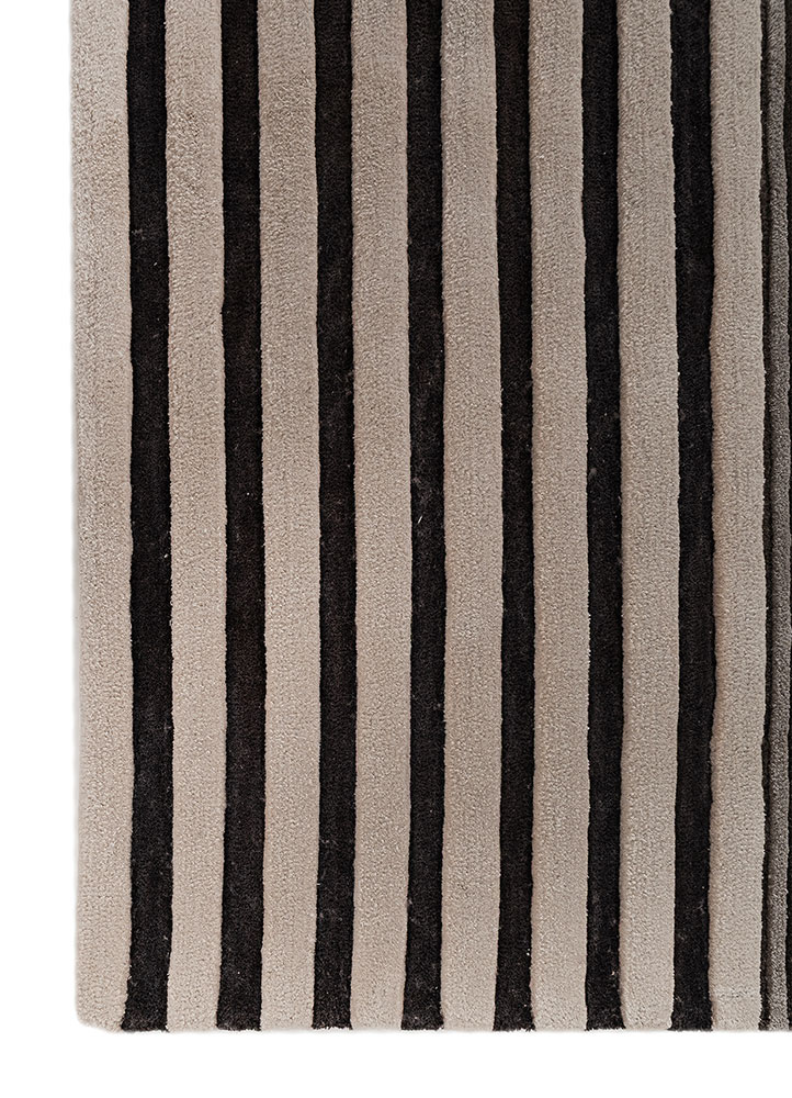 faces ivory wool and viscose hand tufted Rug - Corner