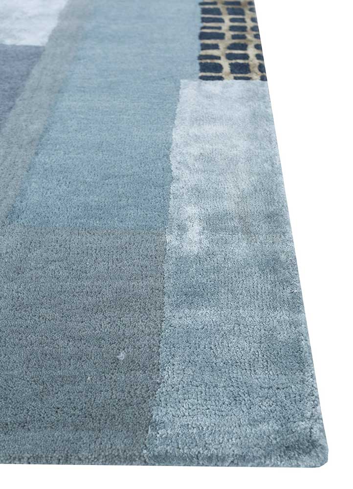 linear blue wool and viscose hand tufted Rug - Corner