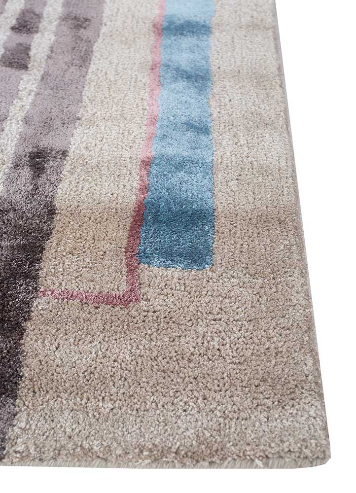 linear blue wool and viscose hand tufted Rug - Corner