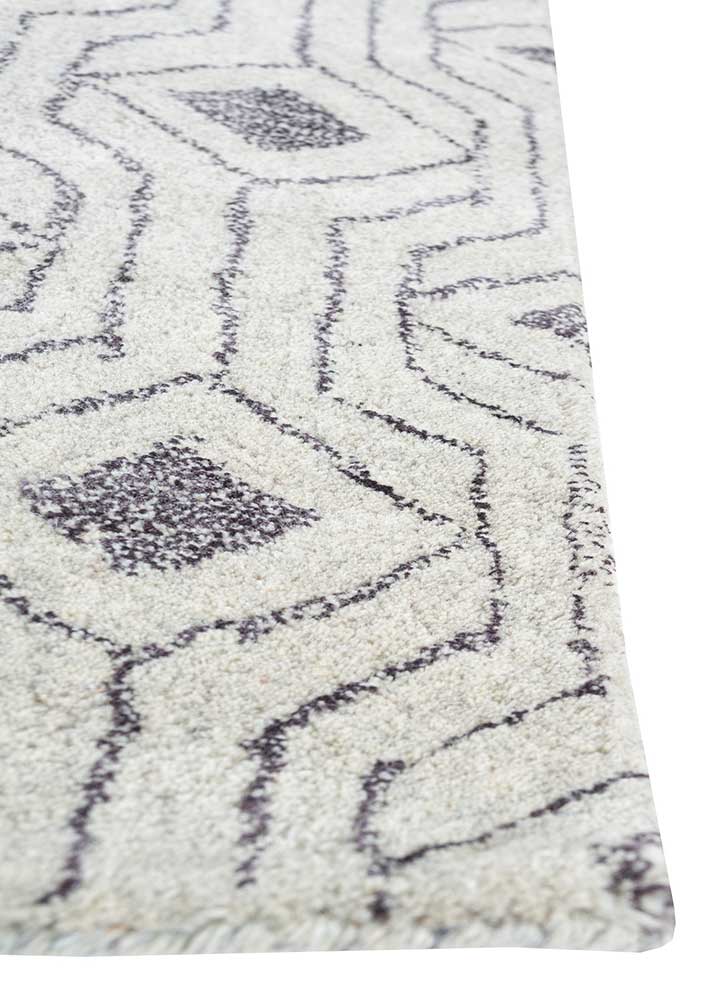 contour ivory wool and viscose hand tufted Rug - Corner