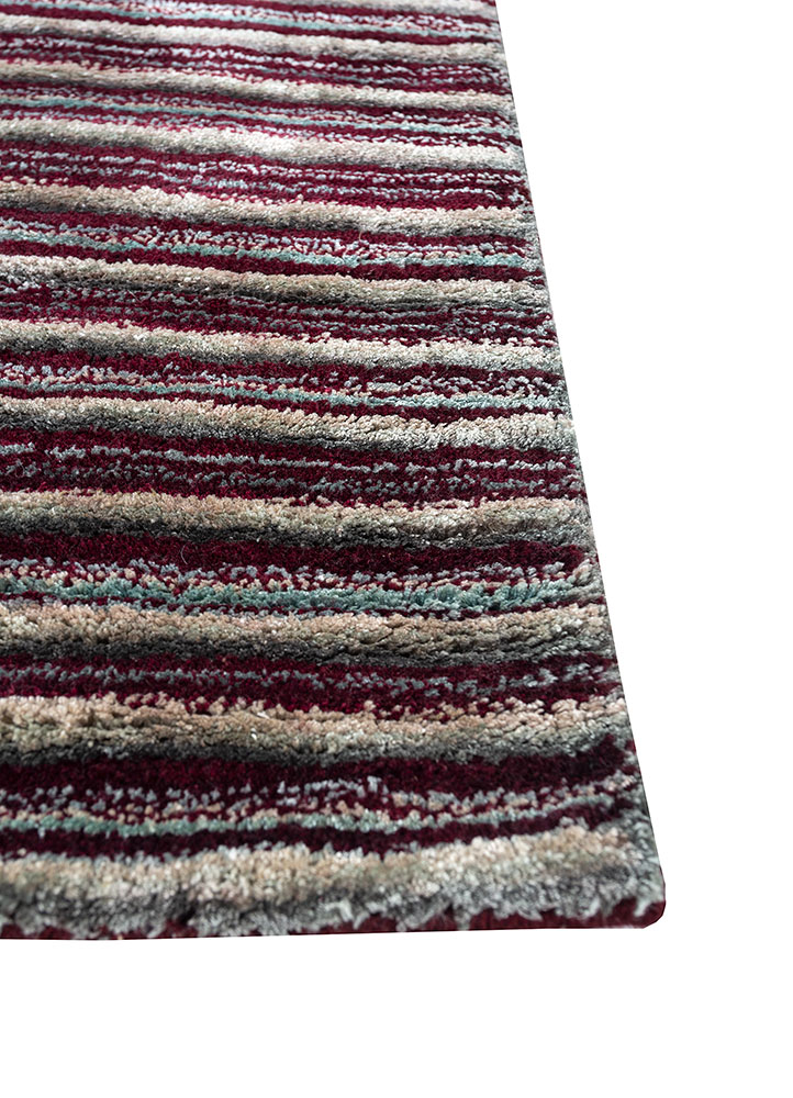 linear pink and purple wool and viscose hand tufted Rug - Corner