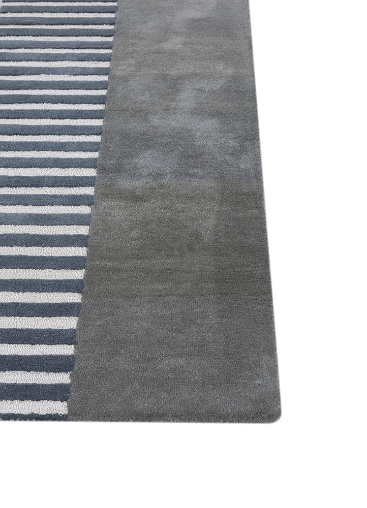 come around blue wool and viscose hand tufted Rug - Corner