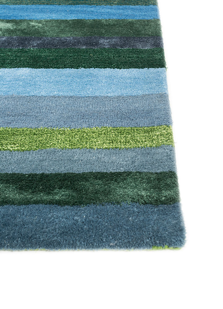 linear blue wool and viscose hand tufted Rug - Corner