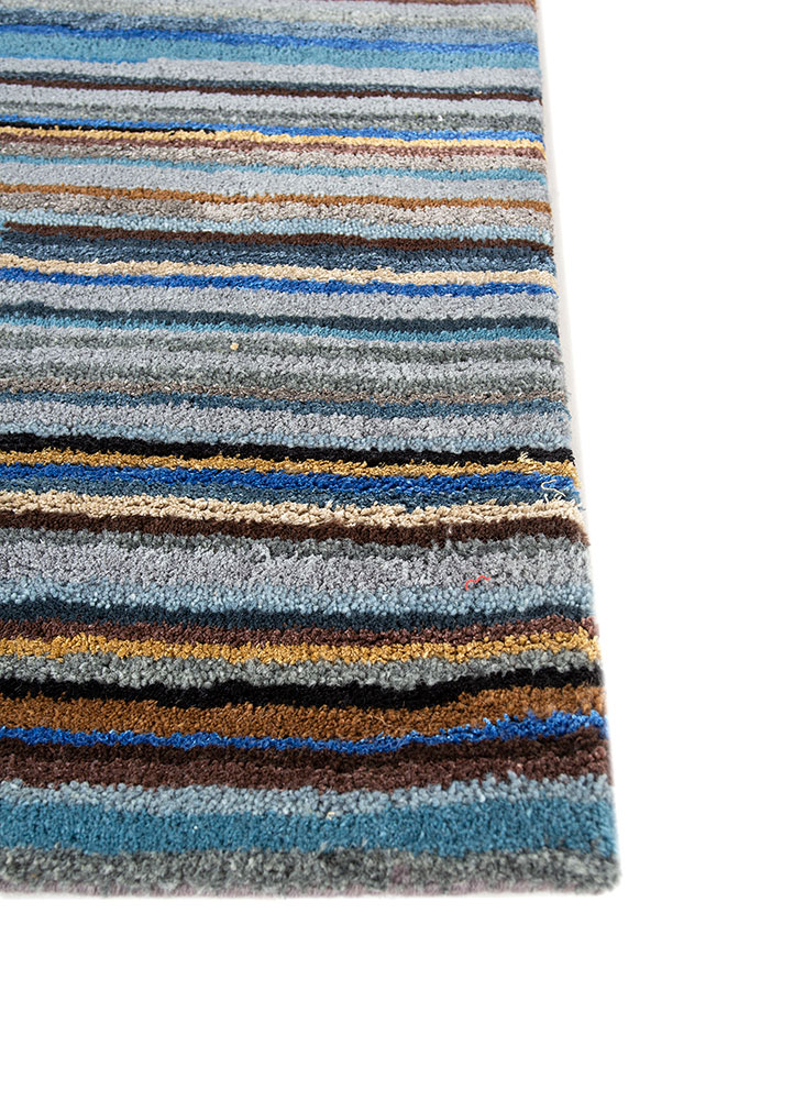 linear blue wool and viscose hand tufted Rug - Corner