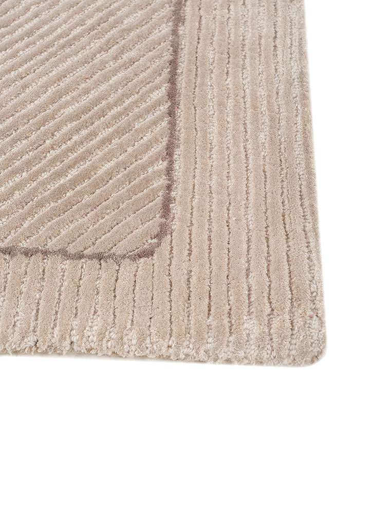 contour ivory wool and viscose hand tufted Rug - Corner