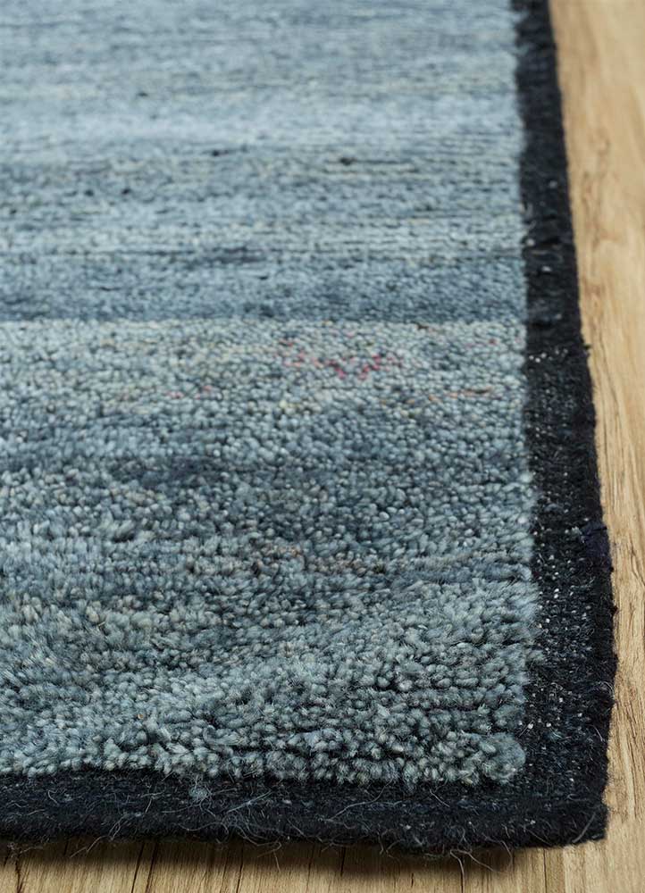 kairos blue afghan wool hand knotted Rug - Corner