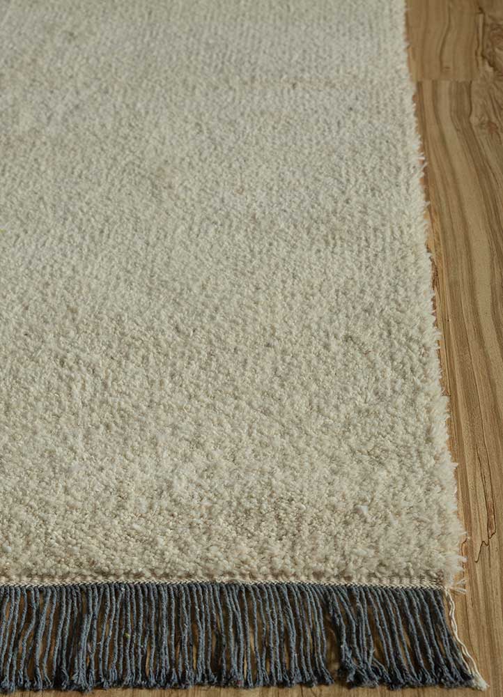 manifest ivory wool hand knotted Rug - Corner