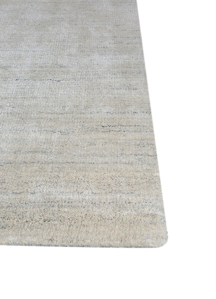 saga ivory wool and silk hand loom Rug - Corner