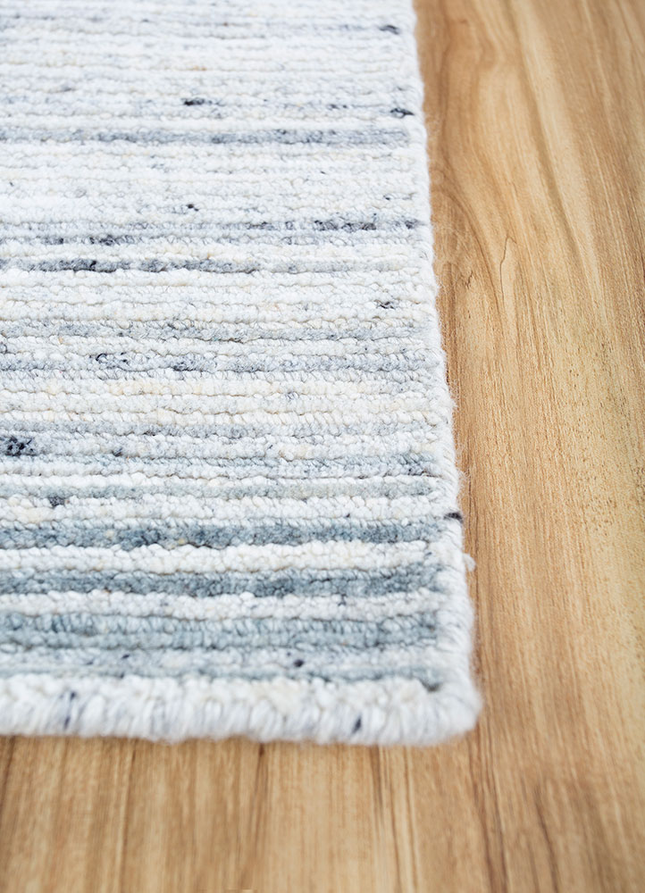 saga ivory wool and viscose hand loom Rug - Corner