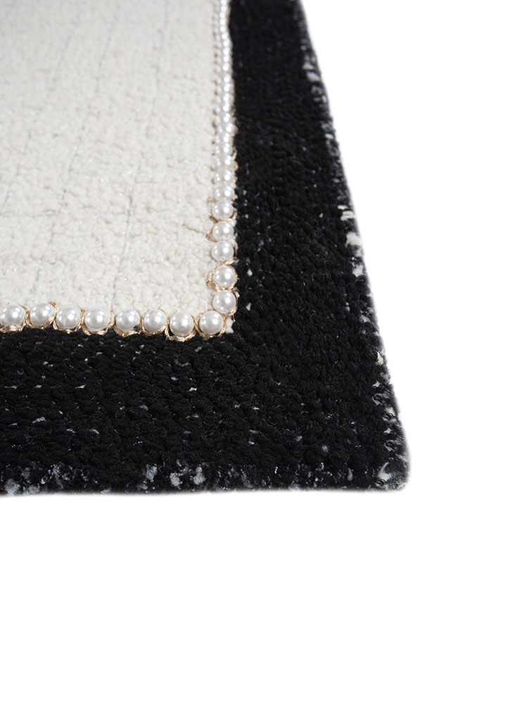 atelier ivory acrylic flat weaves Rug - Corner