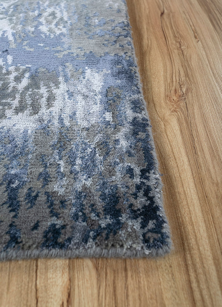 entropy blue wool and bamboo silk hand knotted Rug - Corner