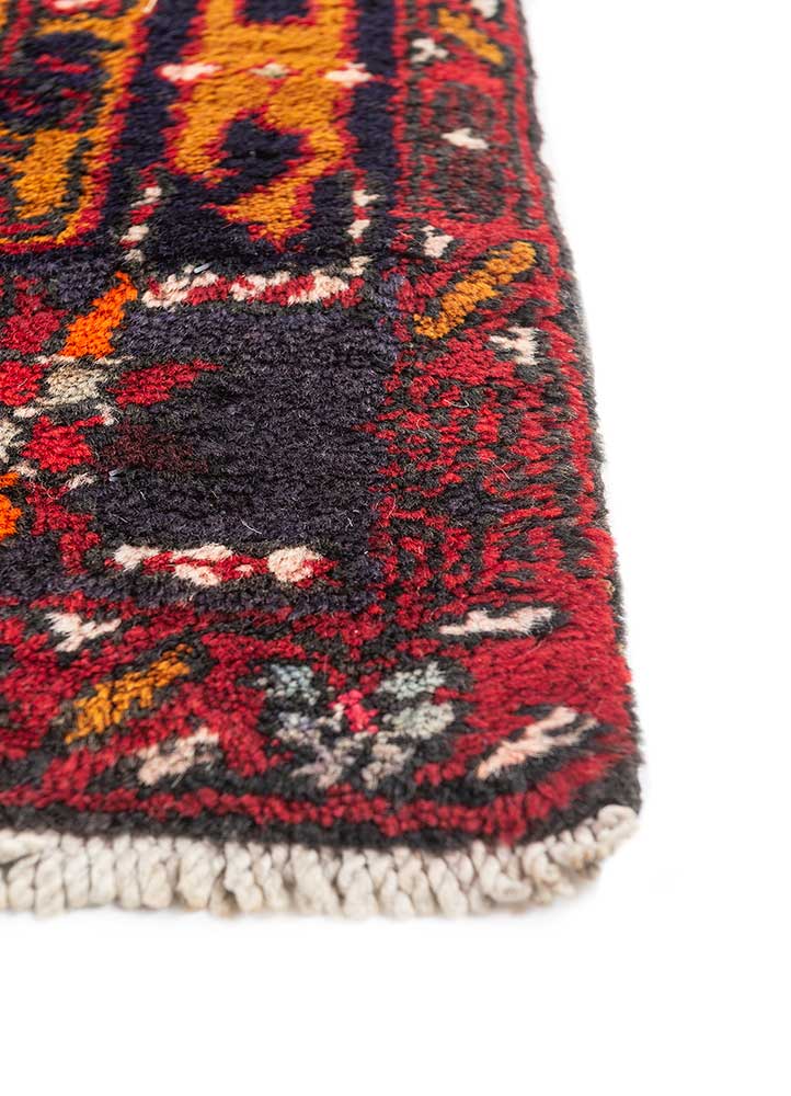 aalam red and orange wool hand knotted Rug - Corner