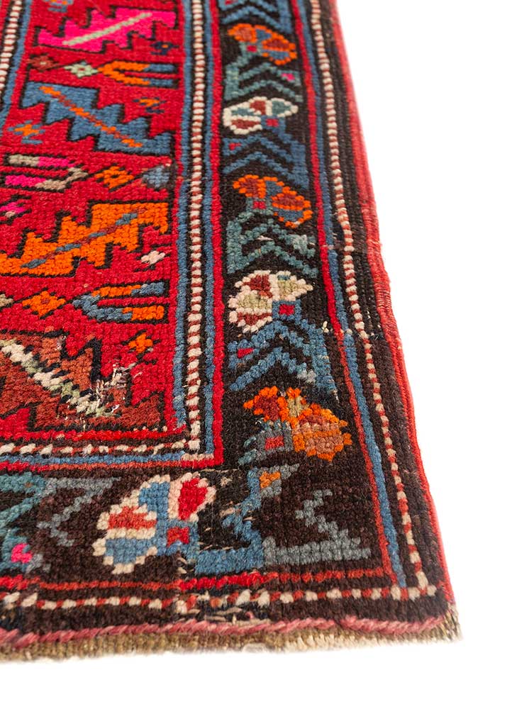 aalam red and orange wool hand knotted Rug - Corner