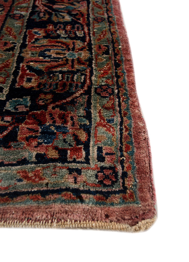 aalam red and orange wool hand knotted Rug - Corner