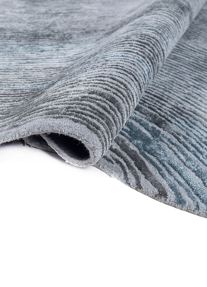 infini blue wool and viscose hand tufted Rug - FloorShot