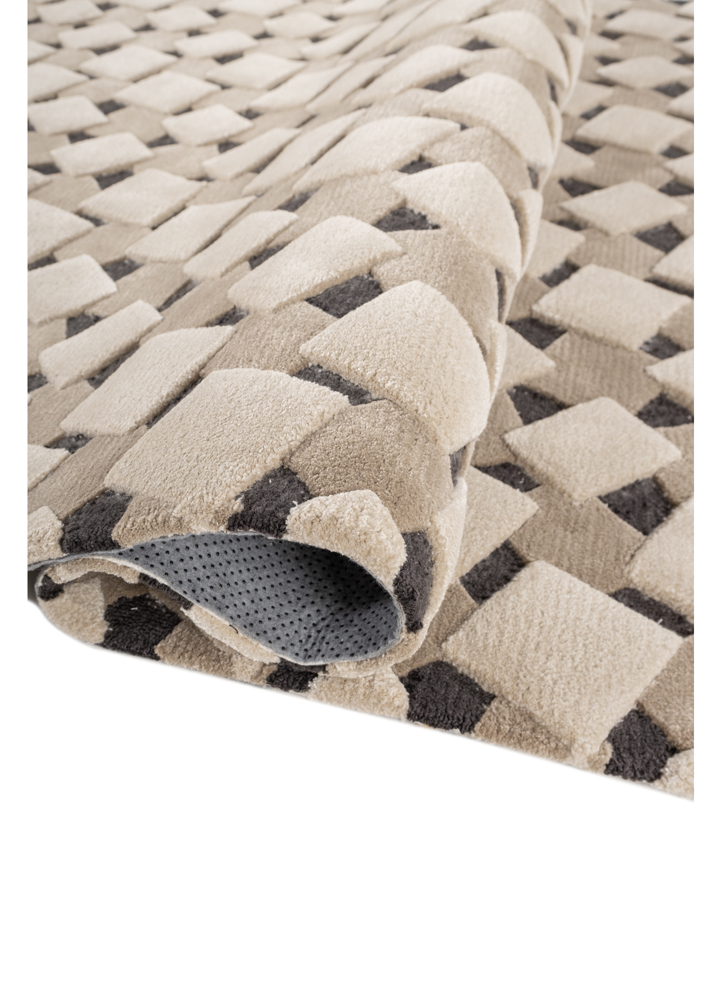 faces beige and brown wool and viscose hand tufted Rug - FloorShot