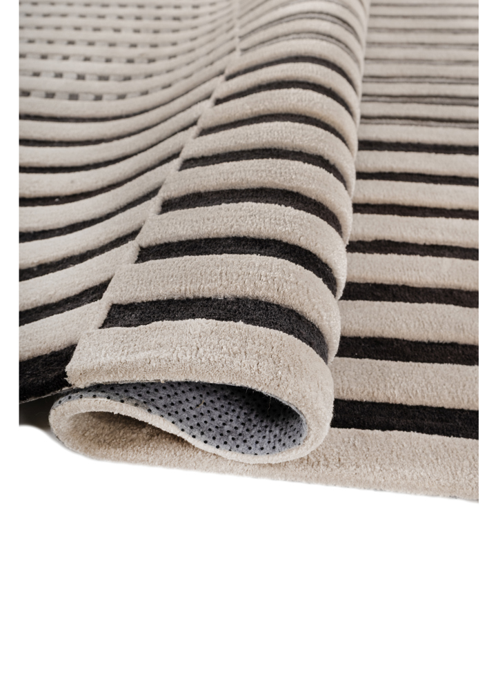 faces ivory wool and viscose hand tufted Rug - FloorShot