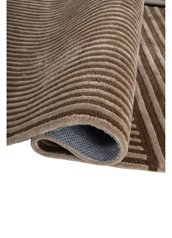 faces beige and brown wool and viscose hand tufted Rug - FloorShot