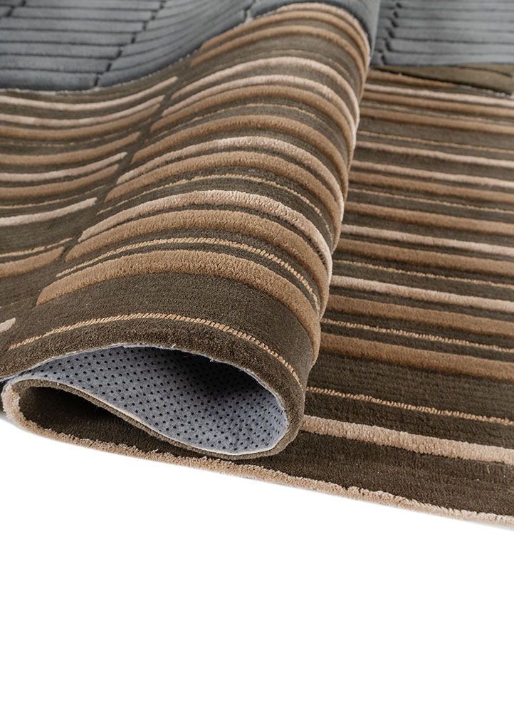 faces beige and brown wool and viscose hand tufted Rug - FloorShot