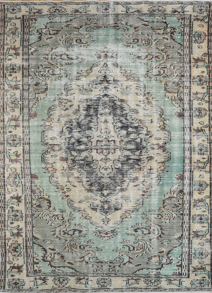vintage green wool hand knotted Rug - HeadShot