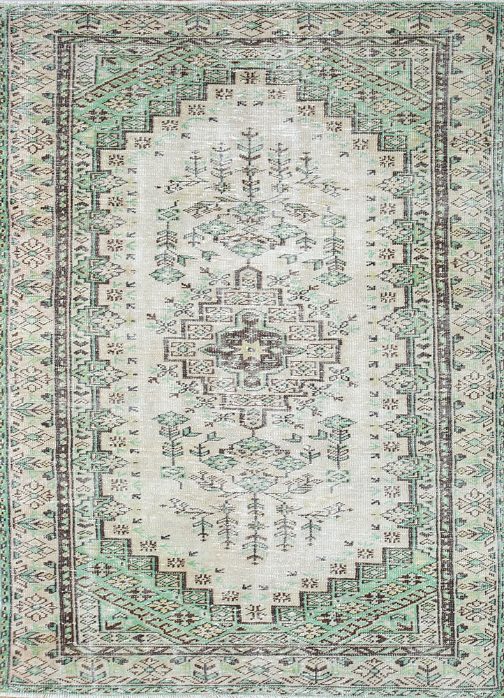 vintage green wool hand knotted Rug - HeadShot