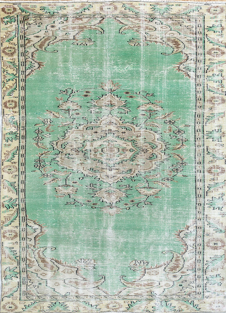 vintage green wool hand knotted Rug - HeadShot