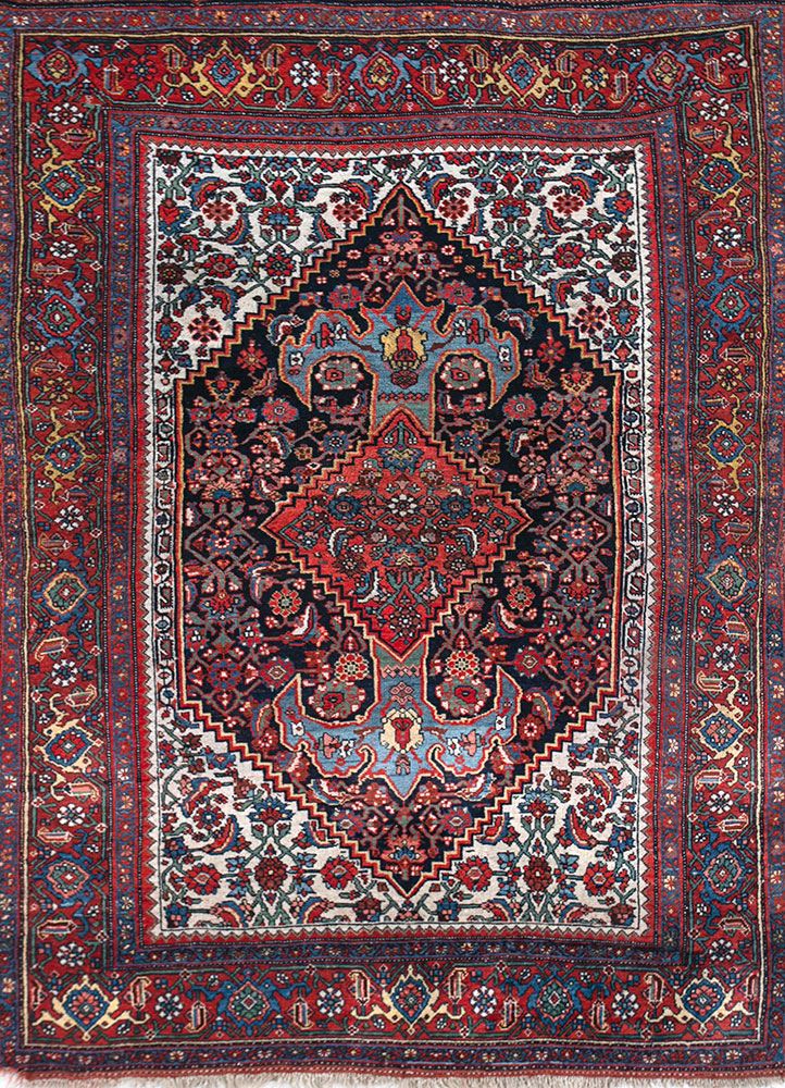 aalam red and orange wool hand knotted Rug - HeadShot