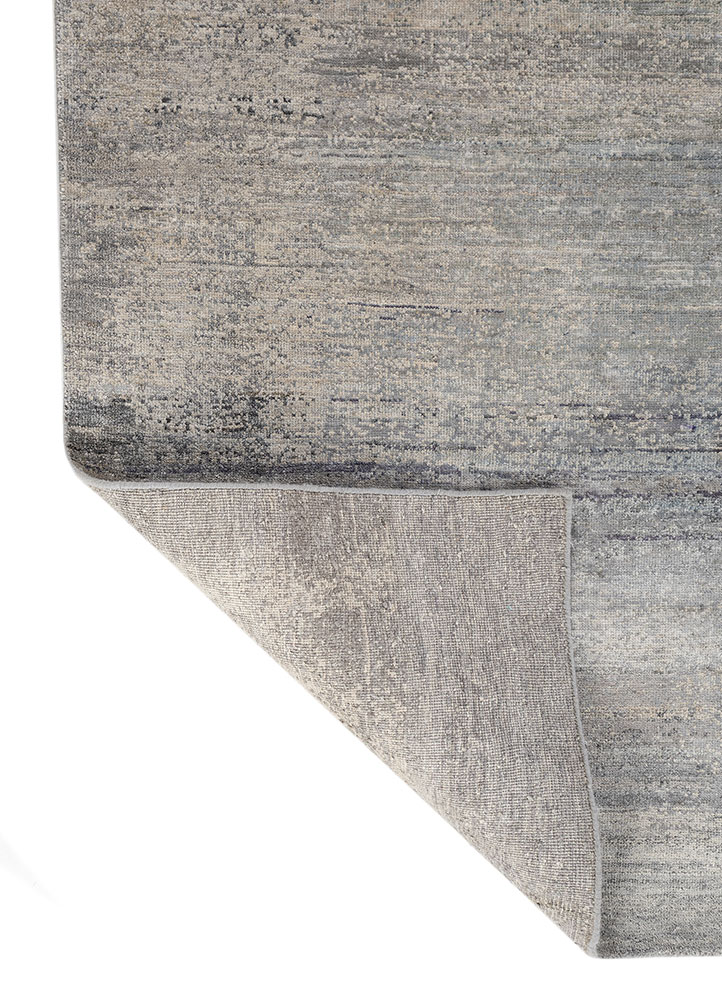 entropy blue wool and silk hand knotted Rug - Perspective