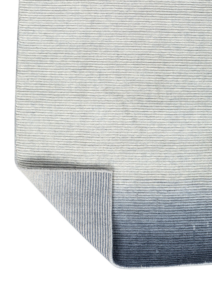 jean blue wool hand loom Rug - Perspective