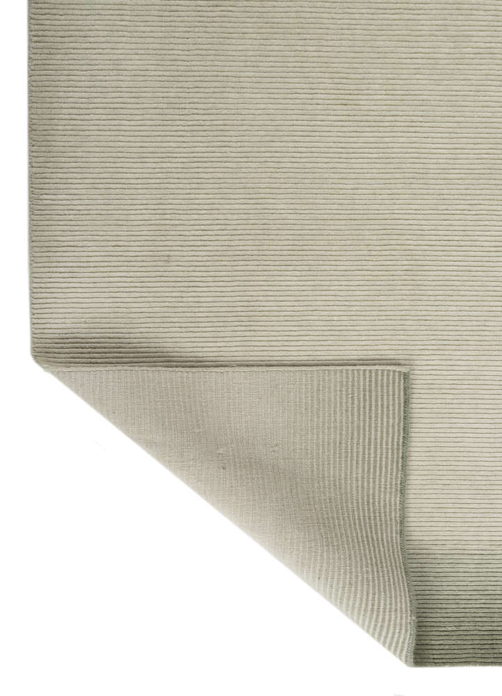 jean green wool hand loom Rug - Perspective