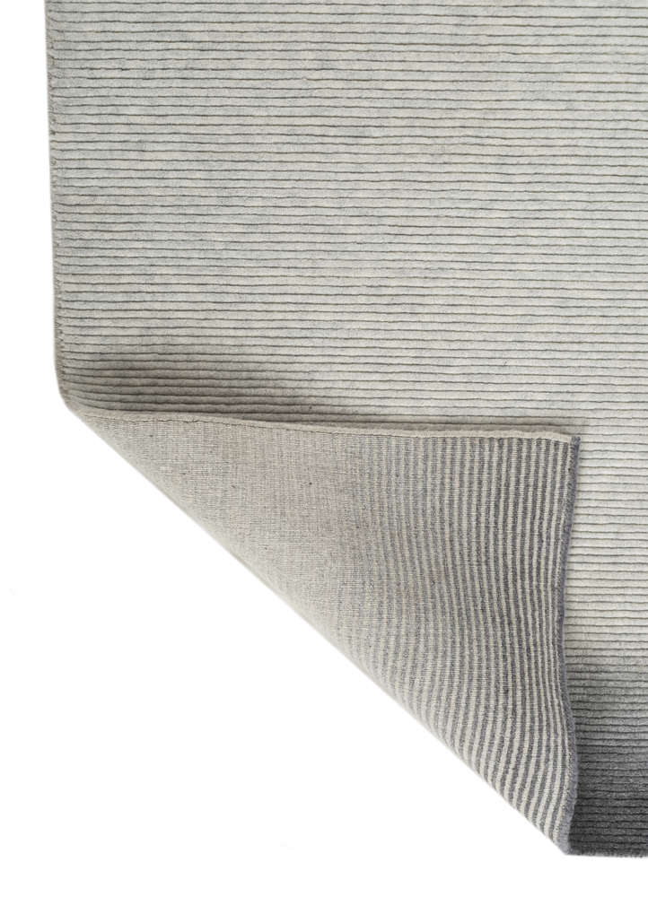 jean grey and black wool hand loom Rug - Perspective