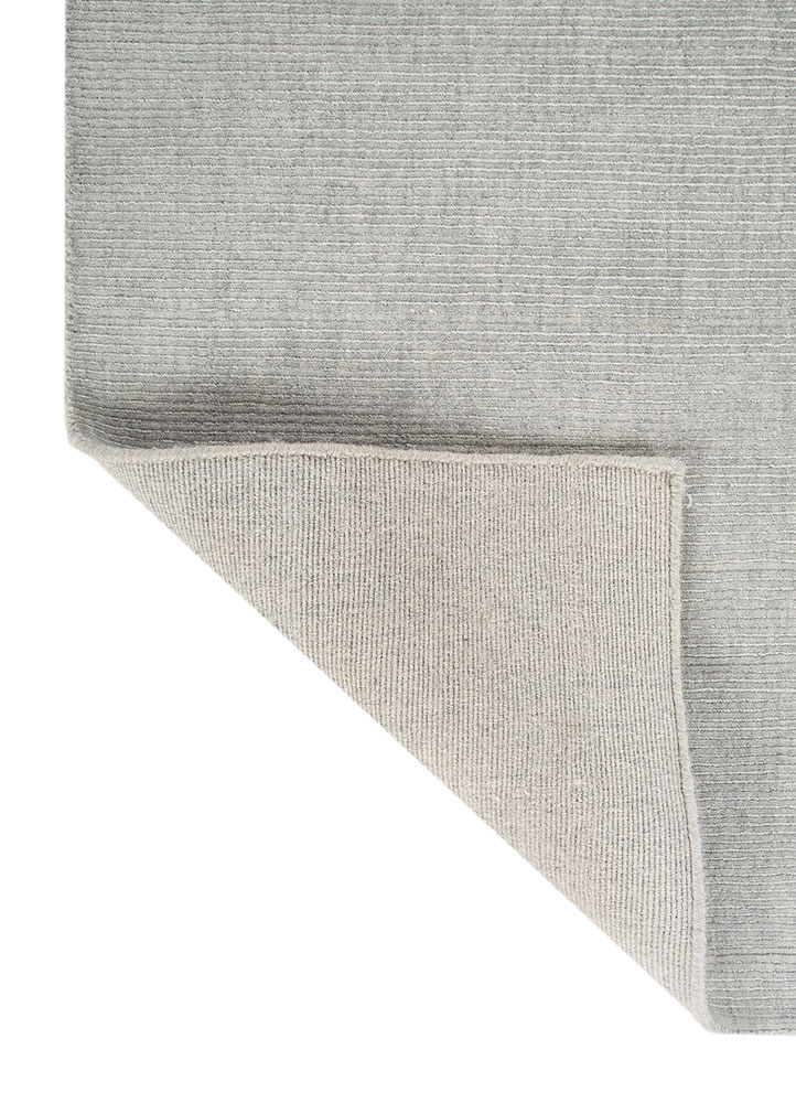 basis blue wool hand loom Rug - Perspective