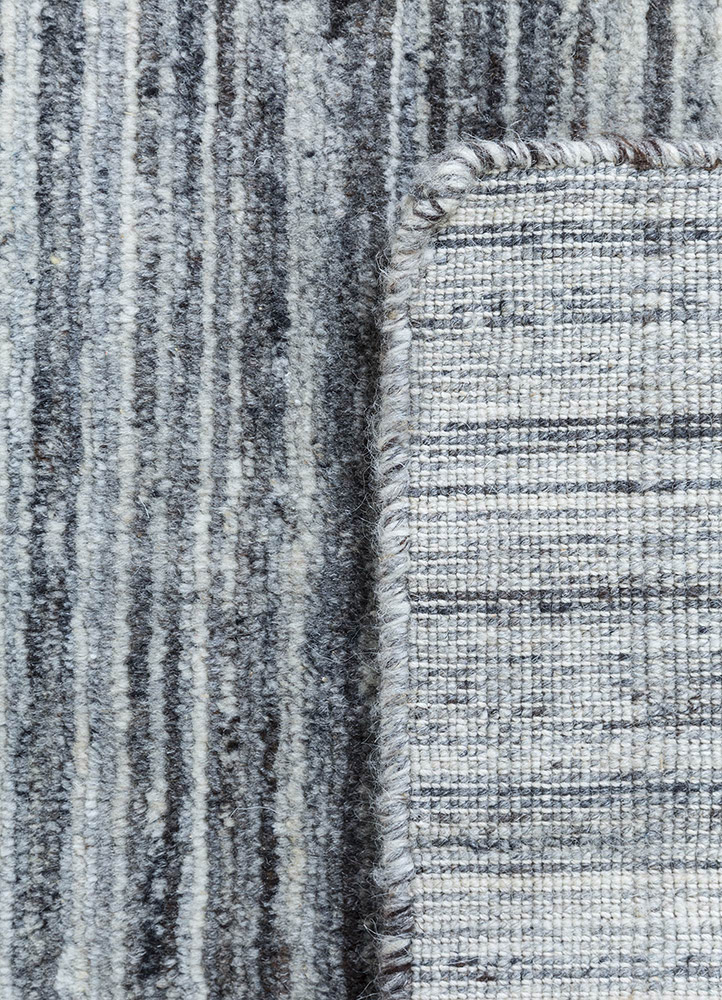 saga grey and black wool hand loom Rug - Perspective