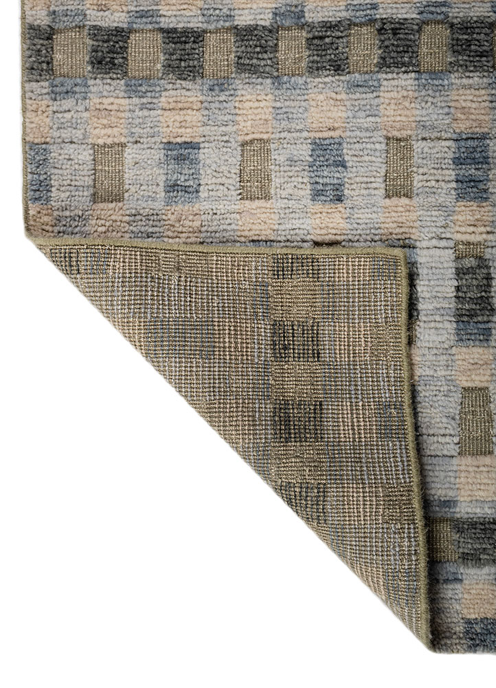 manifest blue wool hand knotted Rug - Perspective