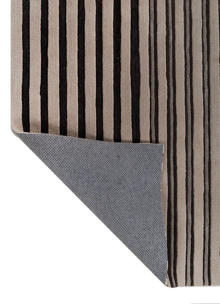 faces ivory wool and viscose hand tufted Rug - Perspective
