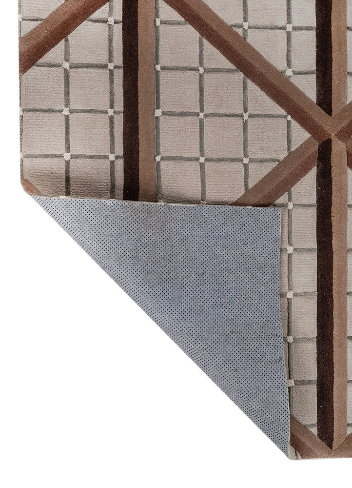 faces ivory wool and viscose hand tufted Rug - Perspective